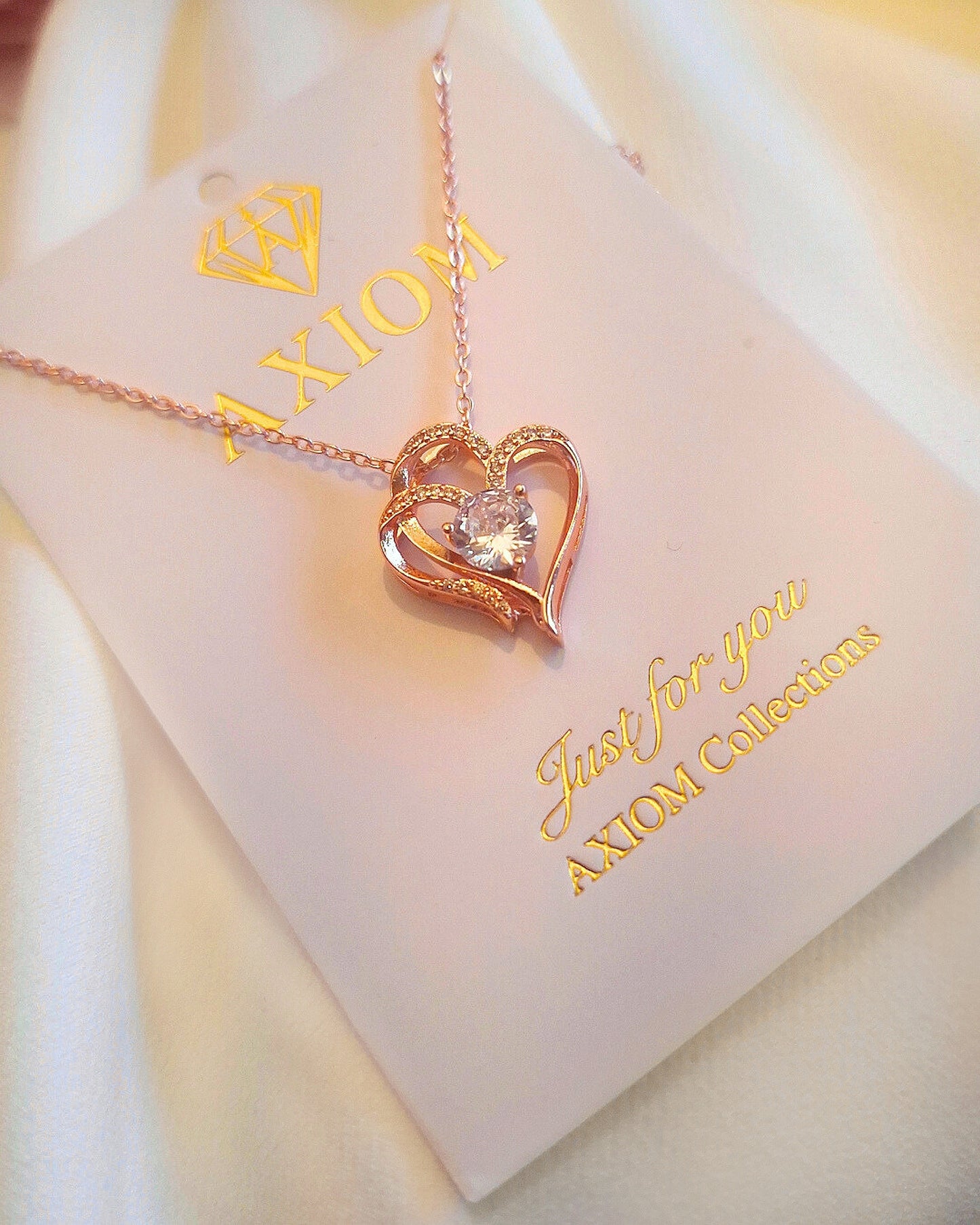 Zircon Rose Gold Intertwined Hearts Necklace